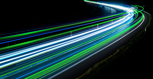 Green,,Blue,And,White,Car,Lights,On,The,Road,At