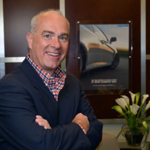 Professional headshot of MOTOR's Paul Moszak