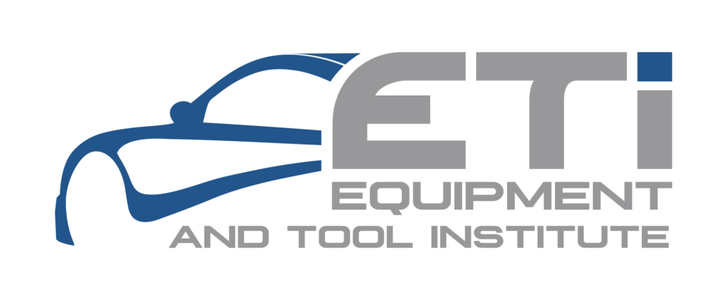 Equipment and Tool Institute (ETI) logo featuring a sleek blue car outline and bold gray lettering, representing innovation and collaboration in automotive tools and technology.